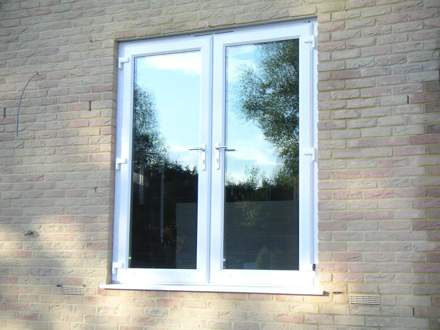 White double glazed french window prices