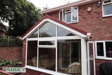 Tiled conservatory roof installation outside